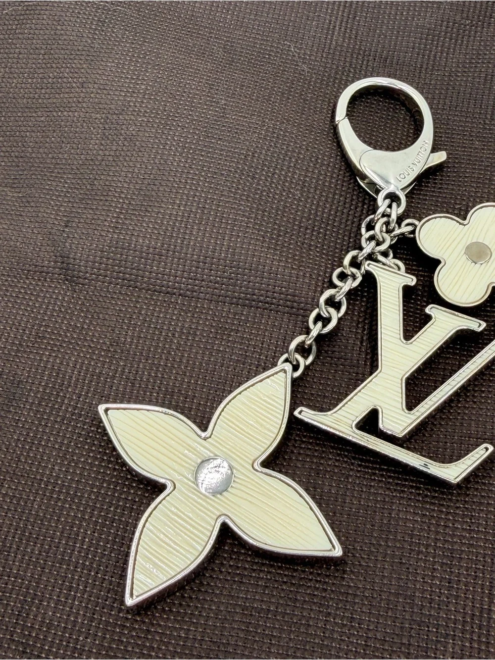 Authentic Louis Vuitton Fleur d’Epi Silver & Cream Bag Charm w/Dust Bag and COA